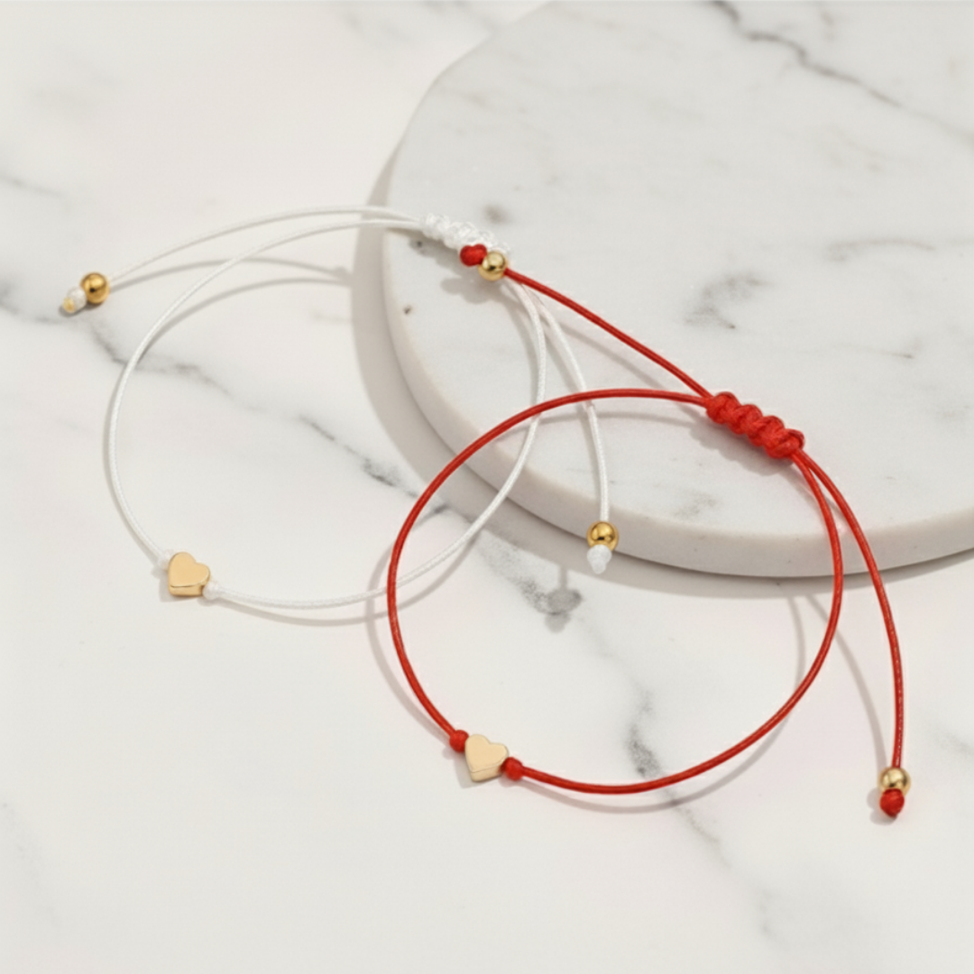 La Dualità. Un filo Rosso e Uno Bianco. Solo Oro.